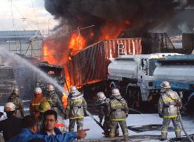 Firemen bring Osaka oil truck blaze under control